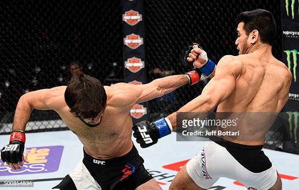 Zubaira Tukhugov punches Phillipe Nover in their featherweight bout during the UFC Fight Night event at The Chelsea at the Cosmopolitan of Las Vegas...