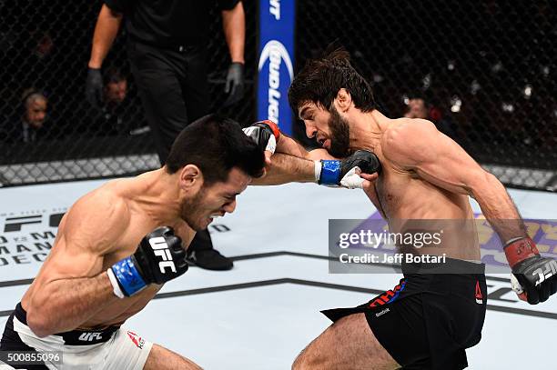 Phillipe Nover and Zubaira Tukhugov exchange punches in their featherweight bout during the UFC Fight Night event at The Chelsea at the Cosmopolitan...