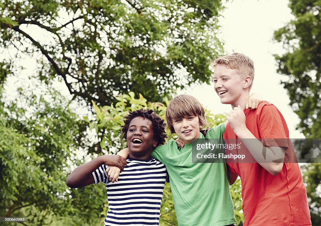 Portrait of three boys laughing