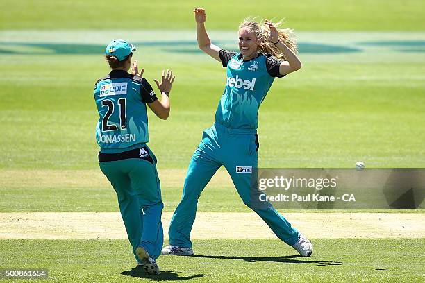 Jessica Jonassen and Holly Ferling of the Heat celebrate the wicket of Nicole Bolton of the Scorchers during the Women's Big Bash League match...