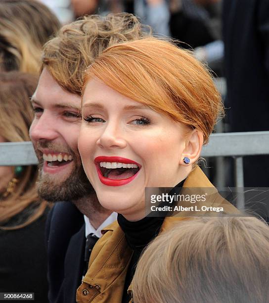 Actor Seth Gabel and actress Bryce Dallas Howard at the Ron Howard Star ceremony on The Hollywood Walk Of Fame held on December 10, 2015 in...
