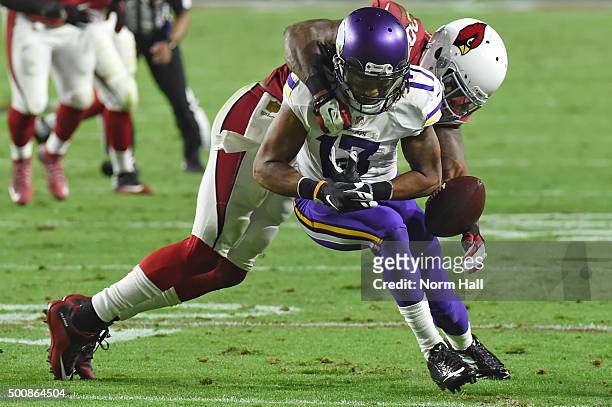 Strong safety Deone Bucannon of the Arizona Cardinals forces a fumble on wide receiver Jarius Wright of the Minnesota Vikings in the second quarter...