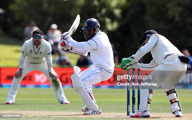 Dimuth Karunaratne of Sri Lanka knicks the ball to be caught by BJ Watling of New Zealand during day two of the First Test match between New Zealand...
