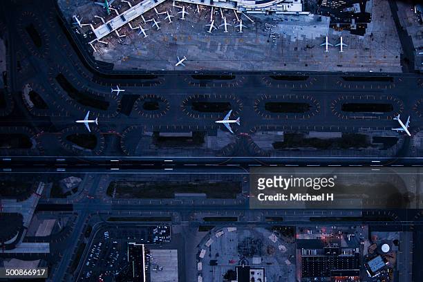 airliners at  gates and control tower at jfk, ny - airport from above stock pictures, royalty-free photos & images