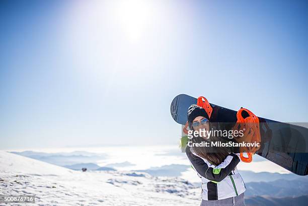 snowboard girl - woman snowboarding stock pictures, royalty-free photos & images