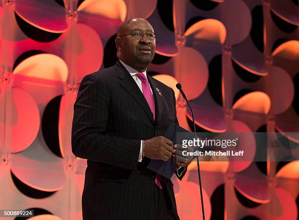 Philadelphia Mayor Michael Nutter presents the award for Female Paralympic Athlete of the Year presented by DICK'S Sporting Goods during the Team USA...