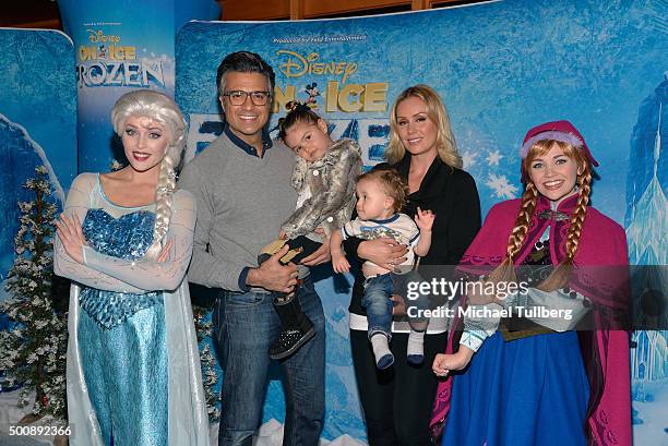 Actor Jaime Camil, daughter Elena Camil, son Jaime Camil III and wife Heidi Balvanera attend the premiere of Disney On Ice's "Frozen" at Staples...