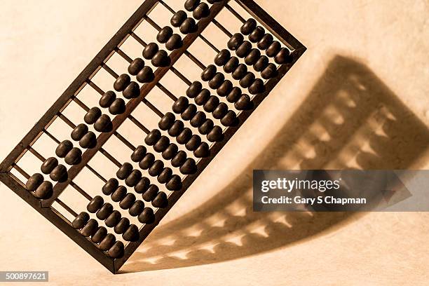 abacus and shadow - abacus stock pictures, royalty-free photos & images