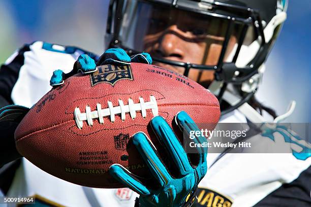 Demetrius McCray of the Jacksonville Jaguars catching passes while warming up before a game against the Tennessee Titans at Nissan Stadium on...