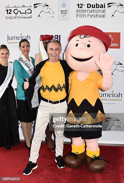 Director Steve Martino and character Charlie Brown attend "The Peanuts Movie" premiere during day three of the 12th annual Dubai International Film...