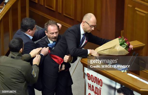 Deputy from the Ukrainian President's political party attacks Ukrainian Prime minister Arseniy Yatsenyuk during the annual report of the government...