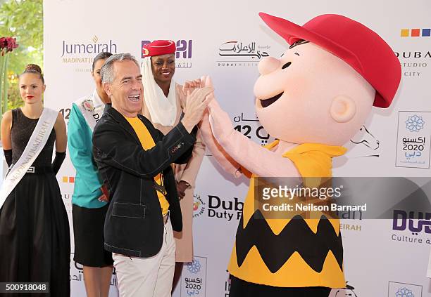 Director Steve Martino and character Charlie Brown attend "The Peanuts Movie" premiere during day three of the 12th annual Dubai International Film...