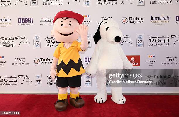 Characters Charlie Brown and Snoopy attend "The Peanuts Movie" premiere during day three of the 12th annual Dubai International Film Festival held at...