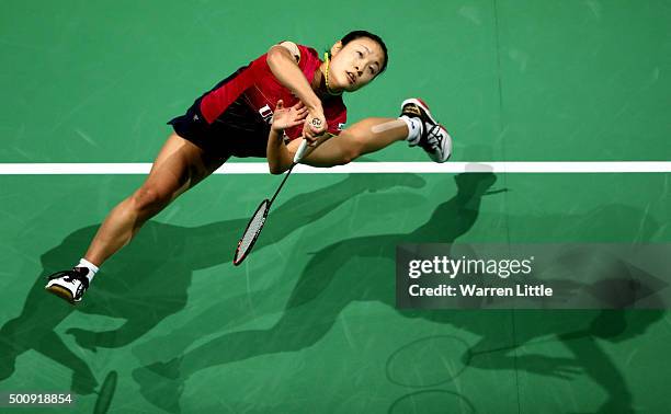 Nozomi Okuhara of Japan in action against Carolina Marin of Spain in the Women's Singles match during day three of the BWF Dubai World Superseries...