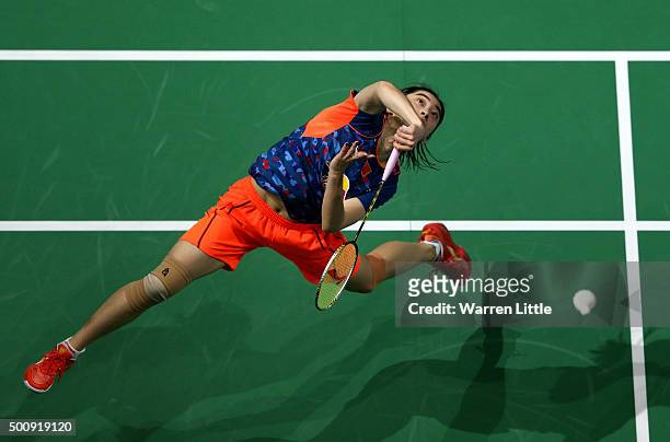Shixian Wang of China in action against Ratchanok Intanon of Thailand in the Women's Singles match during day three of the BWF Dubai World...