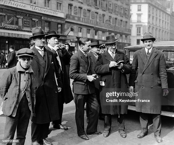 Paris Stock Exchange stockbrokers outside the Bourse de Paris in 1927 in Paris, France.