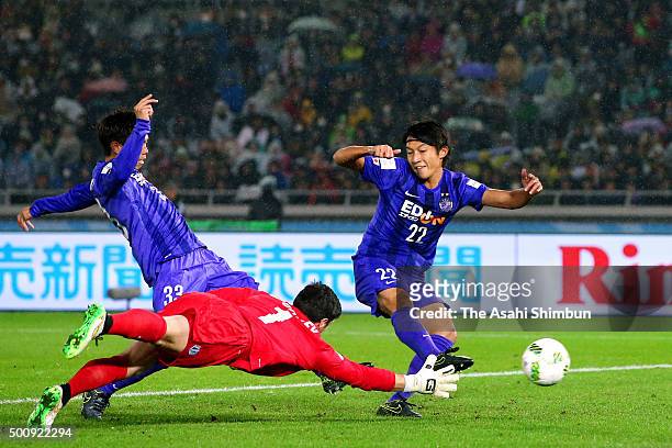 Yusuke Minagawa of Sanfrecec Hiroshima scores his team's first goal during FIFA Club World Cup: Play-off match for the quarter final between...