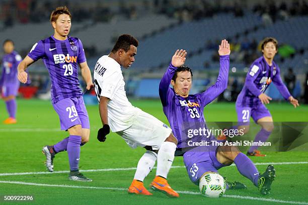 Micah Lea'alafa of Auckland City and Tsukasa Shiotani of Sanfrecce Hiroshima compete for the ball during FIFA Club World Cup: Play-off match for the...