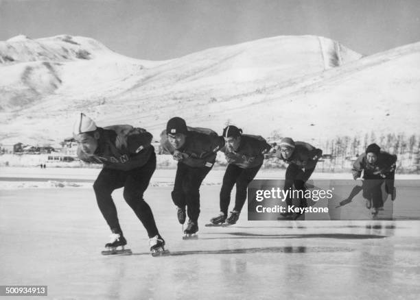 The Japanese Olympic speed skating team train on a lake in preparation for the Squaw Valley 1960 Winter Olympics, Hokkaido, Japan, 31st December 1959.