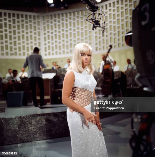 English actress Diana Dors pictured on the television series 'The Dickie Valentine Show' in 1966.