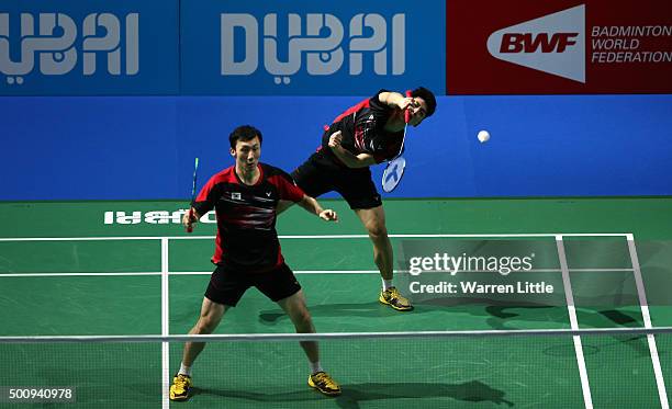 Yong Dae Lee and Yeon Seong Yoo of Korea in action against Hiroyuki Endo and Kenichi Hayakawa of Japan in the Men's Double match during day three of...