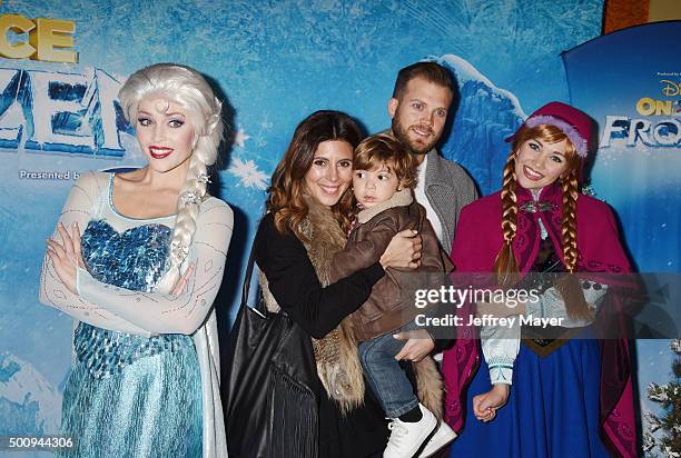 Elsa the Snow Queen, Actress Jamie-Lynn Sigler, Beau Dykstra, Cutter Dykstra and Princess Anna arrive at the premiere of Disney On Ice's 'Frozen' at...