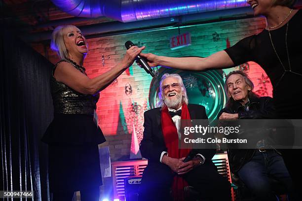 Legendary Canadian musicians Gordon Lightfoot, right, and Ronnie Hawkins, prepare to answer questions on stage, during the launch of their new...