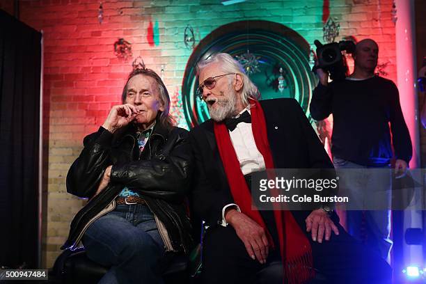 Legendary Canadian musicians Gordon Lightfoot, left, and Ronnie Hawkins, sit on stage as their new collaboration of an old 'The Band' song,...