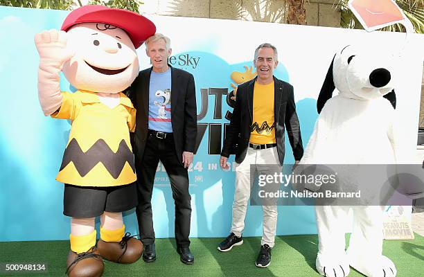 Character Charlie Brown, writer and director Craig Schulz, director Steve Martino and character Snoopy attend "The Peanuts Movie" premiere during day...