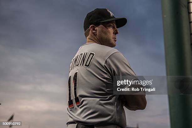 Manager Mike Redmond of the Miami Marlins looks on from the dugout during the game against the Washington Nationals at Nationals Park on Tuesday, May...