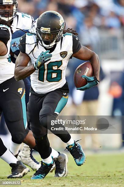 Running back Denard Robinson of the Jacksonville Jaguars carries the ball during a NFL game against the Tennessee Titans at Nissan Stadium on...
