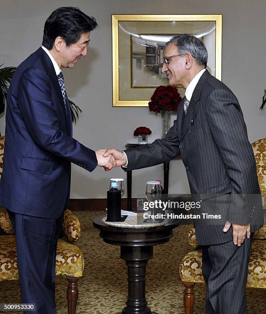 Jawaharlal Nehru University Vice Chancellor Sudhir Kumar Sopory shakes hand with Japnese Prime Minister Shinzo Abe after conferred the degree of...