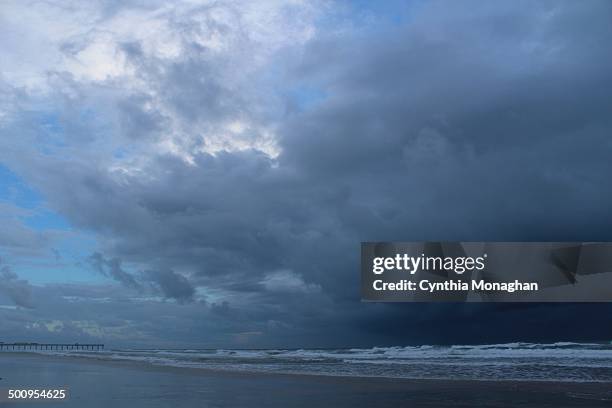 Dark storm clouds with blue sky peaking through in Daytona Beach Shores, Florida as Tropical Storm / Hurricane Arthur on July 2, 2014