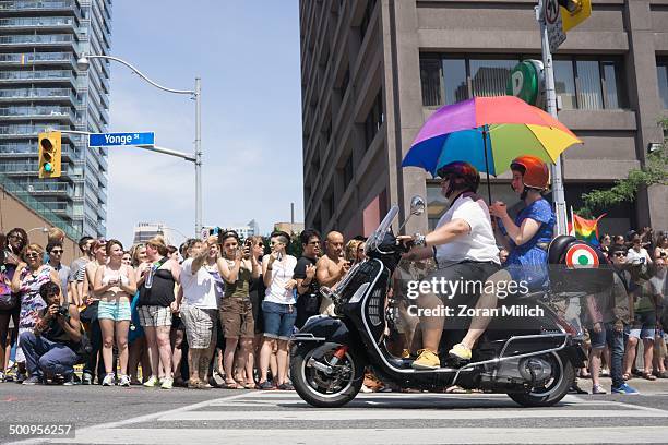 Women on motorcycles at the Dyke Parade at Worldpride Week in Toronto, Ontario, Canada