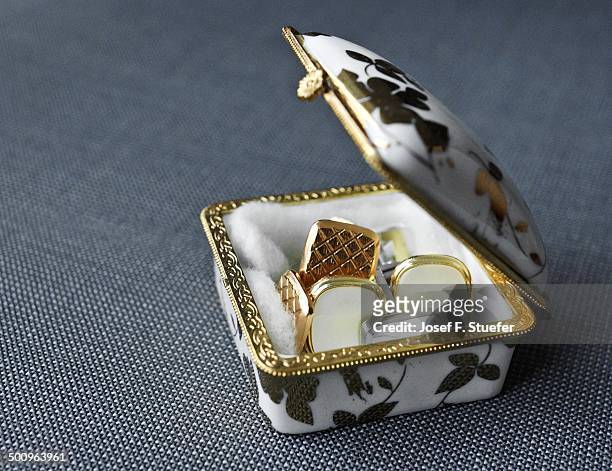 hoarding treasure troves - cufflink stock pictures, royalty-free photos & images