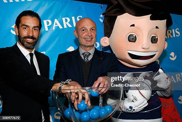 World Champions 1998 soccer Robert Pires and Franck Leboeuf attend the draw for the 1998 tournament Generation at the Paris City hall on December 11,...