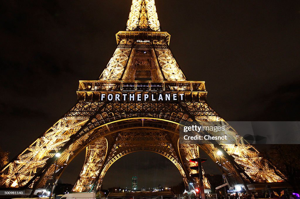 The Eiffel Tower Displays Messages As Part Of 21st Session Of Conference On Climate Change COP21 In Paris