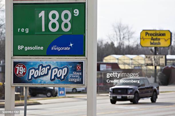 Gas prices are displayed on a sign outside a fueling station in Chillicothe, Illinois, U.S., on Friday, Dec. 11, 2015. The cost of a gallon of...