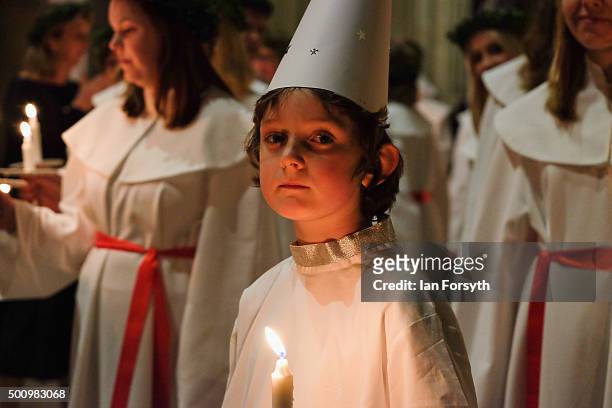 Young 'Starboy' from the Vaxholms boys choir waits for the start of the traditional Swedish festival of Sankta Lucia in York Minster on December 11,...