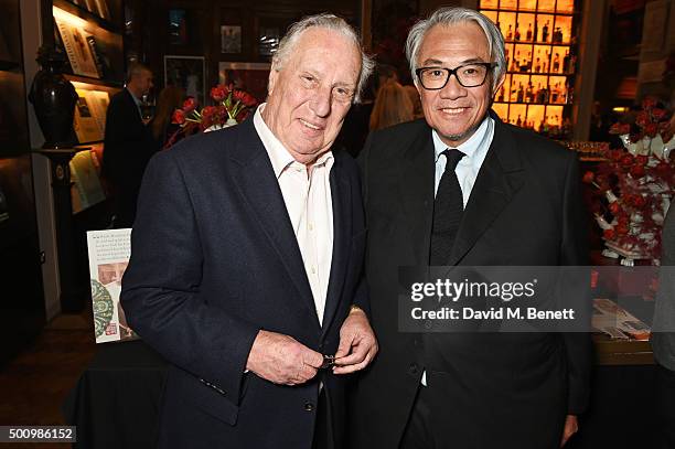 Frederick Forsyth and Sir David Tang attend a champagne reception to celebrate the launch of "Mandarin Oriental: The Book" by Assouline at Maison...