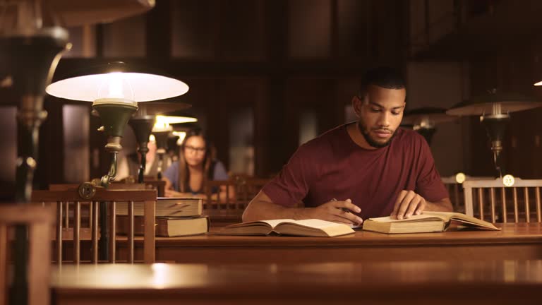 Student Library Guy 5,267 Guy Studying In Library Stock Videos, Footage, & 4K Video Clips ...
