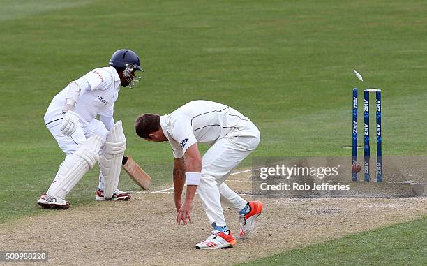 Rangana Herath of Sri Lanka is almost run-out by Doug Bracewell of New Zealand during day three of the First Test match between New Zealand and Sri...