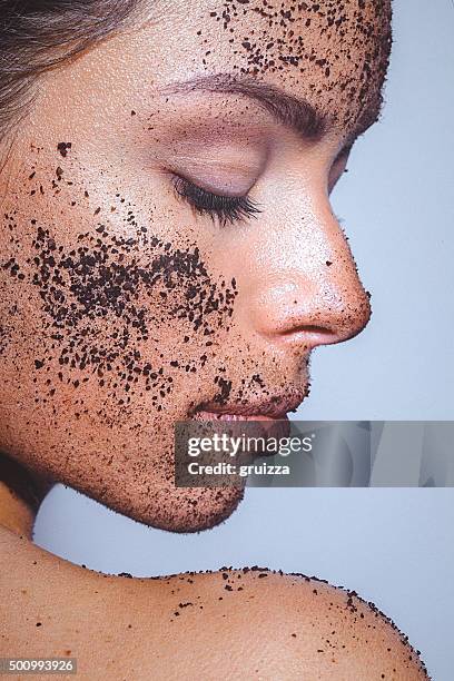 beauty portrait of a young woman with clean healthy skin - coffee powder bildbanksfoton och bilder