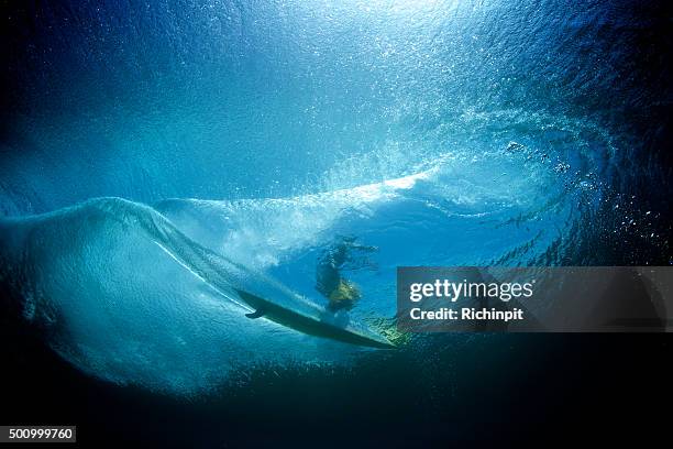 underwater view of longboard surfer on a wave - longboard surfing stock pictures, royalty-free photos & images