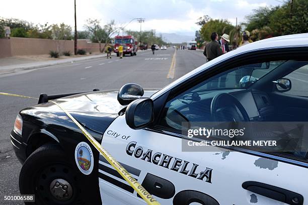 Police car is parked near the Islamic Society of Palm Springs in Coachella, California on December 11 after the area was sealed off when a fire broke...