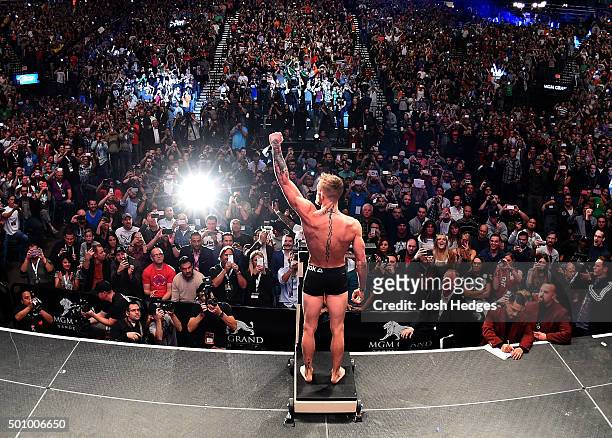 Interim featherweight champion Conor McGregor of Ireland weighs in during the UFC 194 weigh-in inside MGM Grand Garden Arena on December 10, 2015 in...