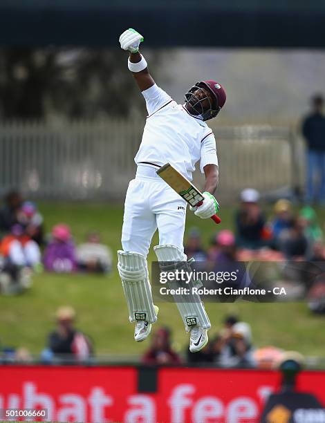 Darren Bravo of the West Indies celebrates after reaching his century during day three of the First Test match between Australia and the West Indies...