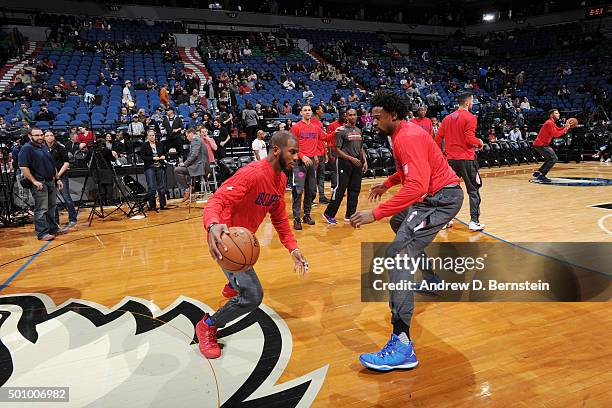 Chris Paul of the Los Angeles Clippers and DeAndre Jordan of the Los Angeles Clippers warm up before the game against the Minnesota Timberwolves on...