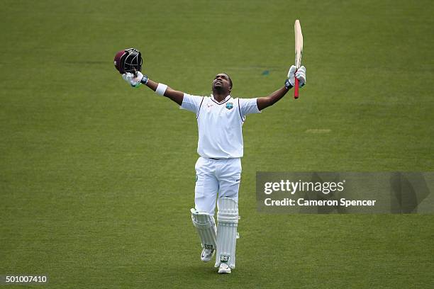 Darren Bravo of the West Indies celebrates after reaching his century during day three of the First Test match between Australia and the West Indies...