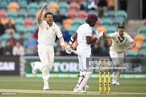 James Pattinson of Australia celebrates dismissing Rajendra Chandrika of the West Indies during day three of the First Test match between Australia...